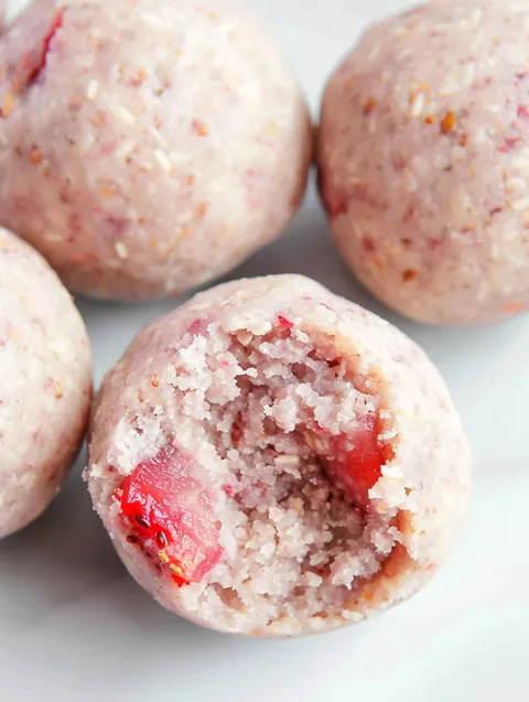 Three balls of strawberry protein.
