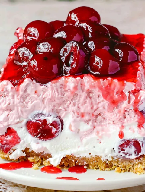 A slice of cherry cheesecake lush.